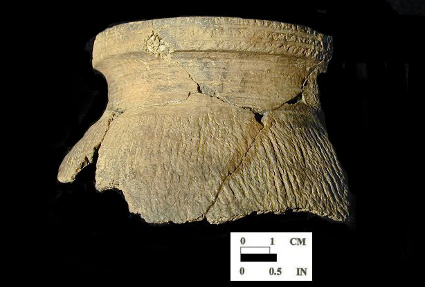 Shenks Ferry partial cord-marked vessel (mended) with incised decoration on rim and neck, from the Rosenstock site 18FR18/168.